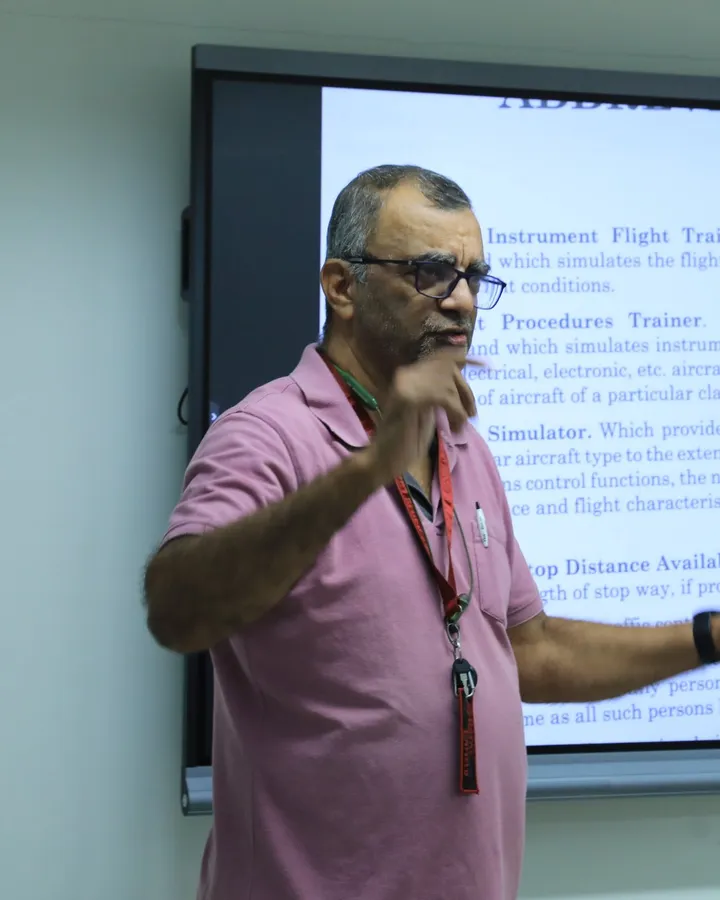 Col Naren Divekar teaching an Air Regulations class at Aerogenesis