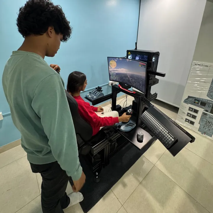 Flight simulator station with curved display, Airbus-style sidestick and throttle