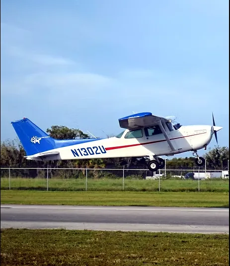 Single-engine training aircraft on the apron