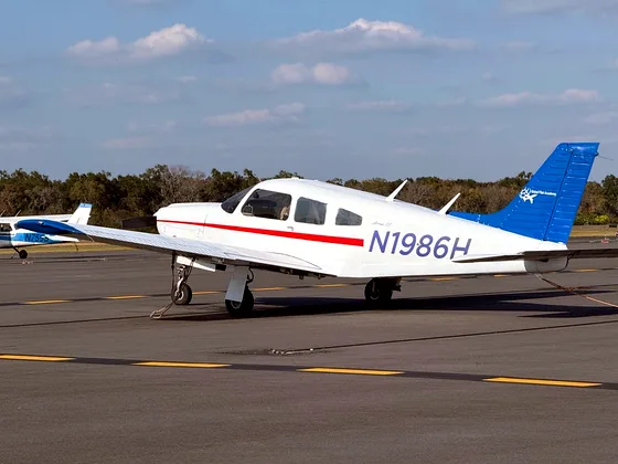 Single-engine training aircraft on the ramp