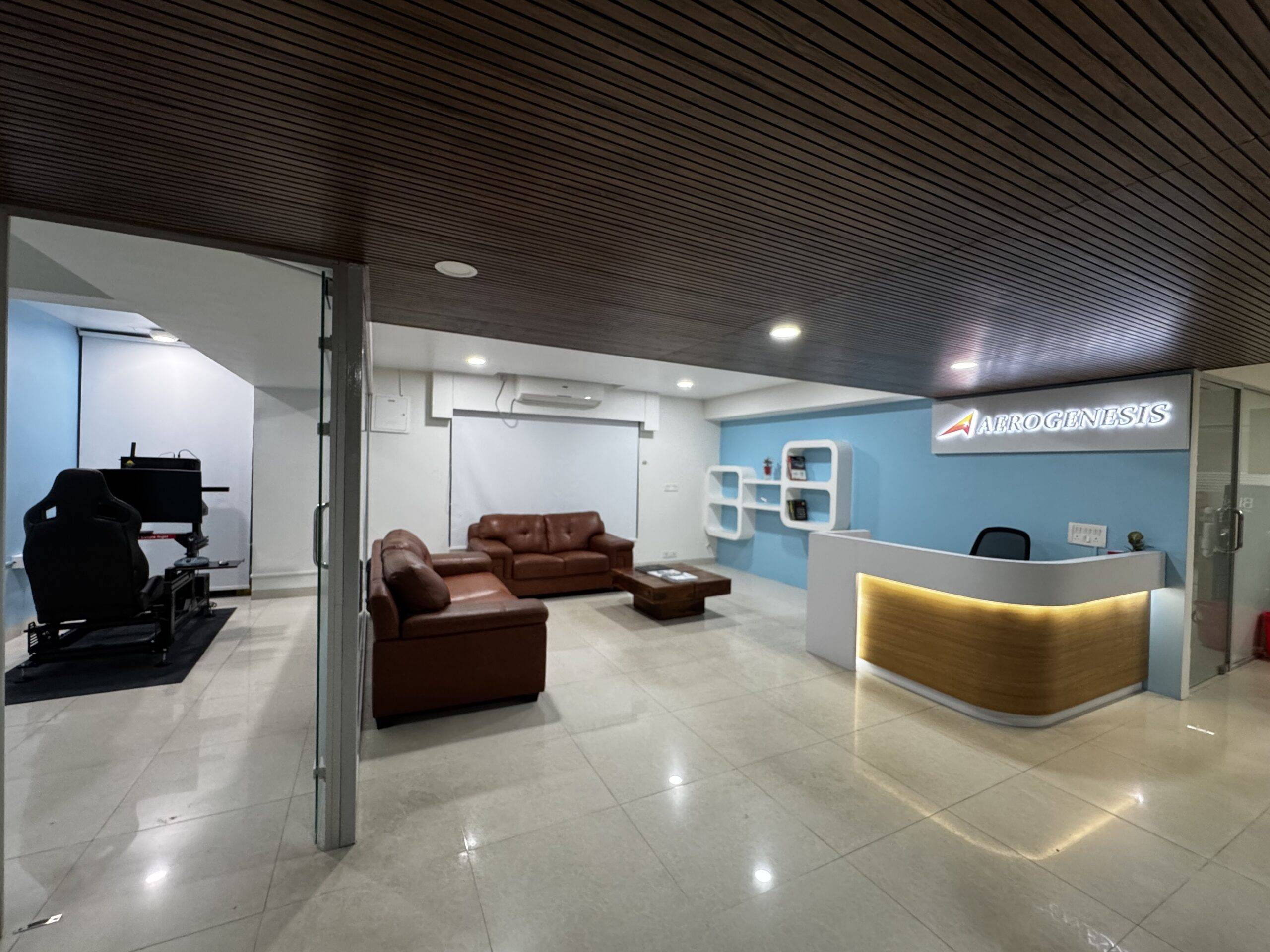Aerogenesis aviation academy — reception and lounge area with simulator visible, kalyan nagar, bengaluru